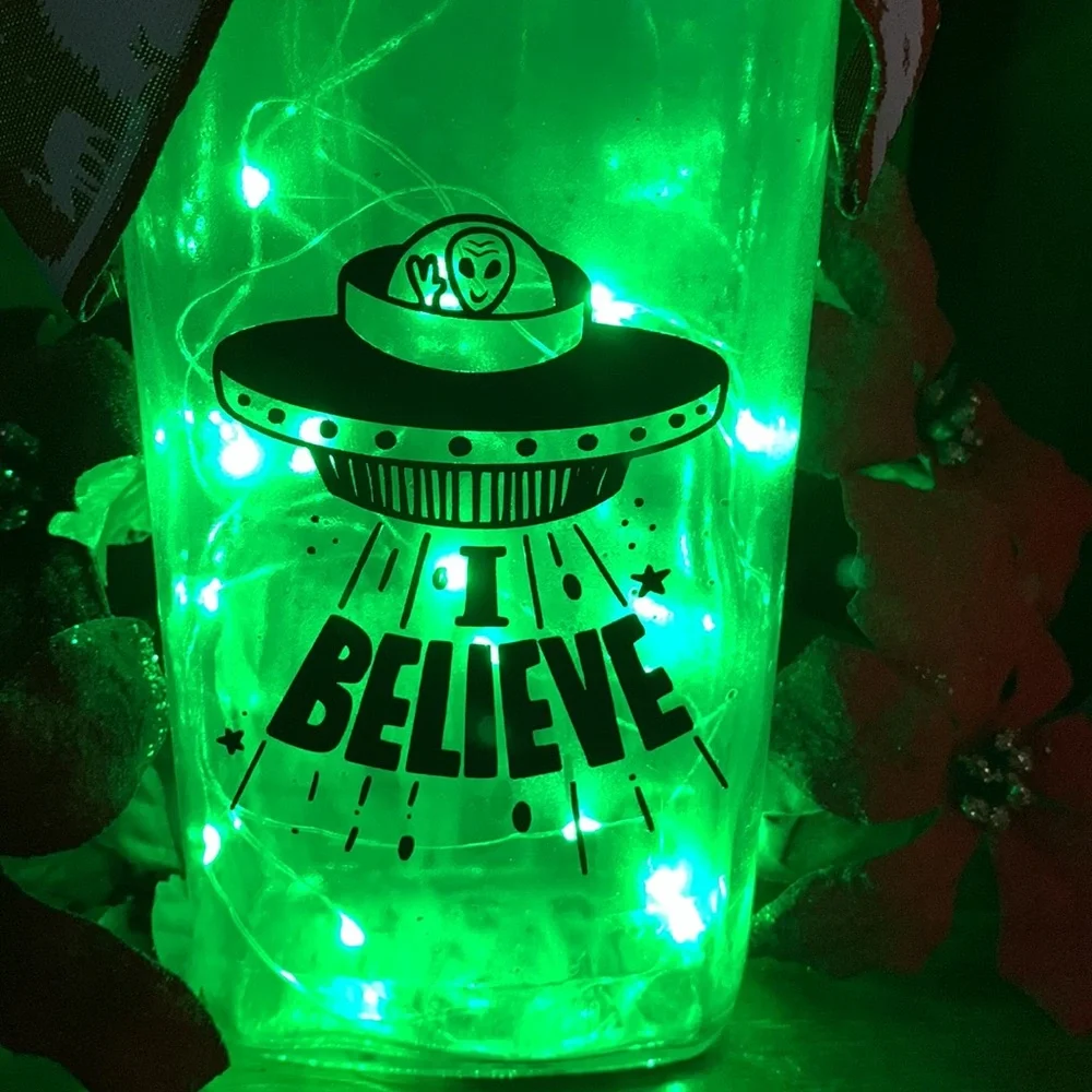 Hand crafted Festive Alien ‘I Believe’ silver painted Bottle lantern